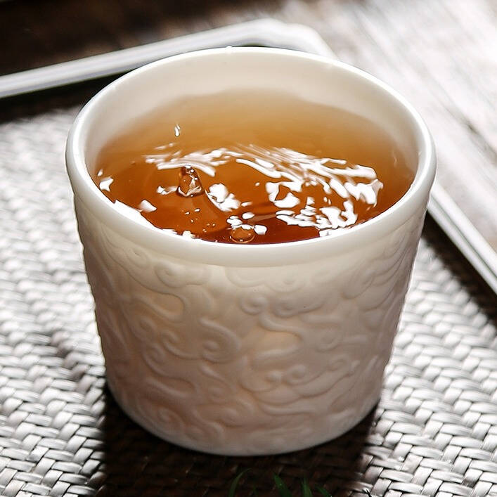 金镶玉高白瓷浮雕茶杯